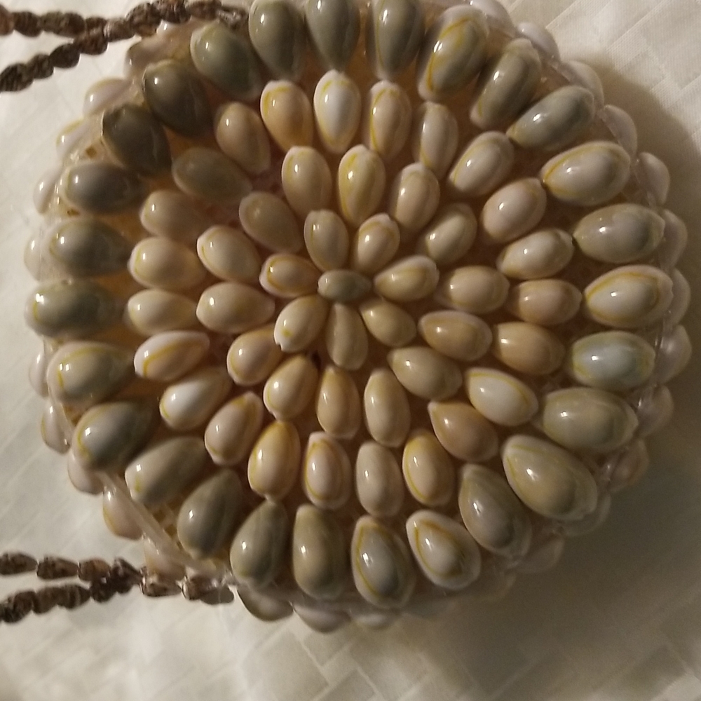 Imported  hand crafted shell handbag